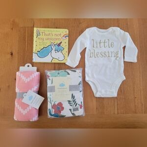 New baby items -crib sheet, muslin blanket, onesie and book. Great gift!